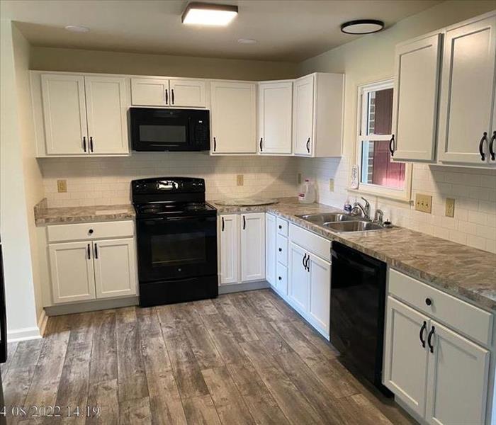 The completion of remodeling after fire damage to kitchen